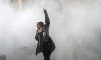 Ten dead in overnight Iran unrest as Rouhani strikes defiant note