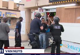 TV reporter tries to stop LA police arresting black store owners and good Samaritans instead of ...