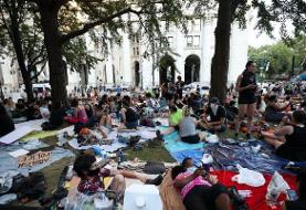 Photos show how protesters in New York City are occupying City Hall, demanding the police budget ...