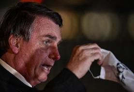 Brazil: Bolsonaro reportedly uses homophobic slur to mock masks