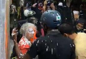 Woman confronting vandals covered in paint during renewed Portland protests