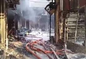 آتش‌سوزی یک پاساژ در محدوده بازار تهران/ ۱۱ مغازه در آتش سوخت