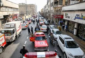 آخرین وضعیت آتش‌سوزی ساختمان تجاری در خیابان بهار