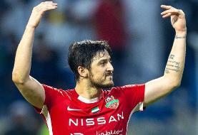 بوسه سردار آزمون بر جام قهرمانی سوپرکاپ امارات (+عکس)