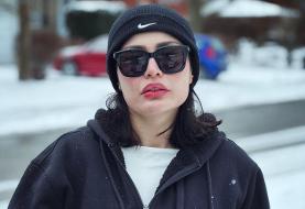 استایل زمستانی شیوا طاهری در برف‌های کانادا؛ ترکیب مشکی و کرم (عکس)